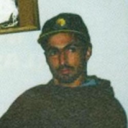 RICK E. WHITE